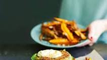 Open veggie burger with sweet potato wedges Open veggie burger with sweet potato wedges