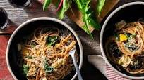 Fresh whole wheat spaghetti with wilted greens and fried eggs Fresh whole wheat spaghetti with wilted greens and fried eggs