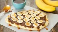 Nutella, Banana, and Caramel Dessert Pizza Nutella, Banana, and Caramel Dessert Pizza