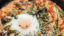 White Skillet Pizza with Spring Greens and an Egg White Skillet Pizza with Spring Greens and an Egg
