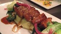 SLOW-ROASTED PORK BELLY with Sautéed Baby Bok Choy & Pine Nuts SLOW-ROASTED PORK BELLY with Sautéed Baby Bok Choy & Pine Nuts