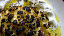 Whole Roasted Cauliflower with Lemony Yogurt Sauce Whole Roasted Cauliflower with Lemony Yogurt Sauce