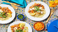 Moroccan Chicken Sausage Tagine with Dried Apricots and Chickpeas over Couscous Moroccan Chicken Sausage Tagine with Dried Apricots and Chickpeas over Couscous