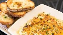 How to Make The Cheesecake Factory’s Warm Crab and Artichoke Dip – PureWow How to Make The Cheesecake Factory’s Warm Crab and Artichoke Dip – PureWow