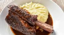 Slow cooked beef short ribs in red wine sauce Slow cooked beef short ribs in red wine sauce
