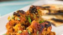 Baked Caulifower with Indian Spiced Tomato Sauce Baked Caulifower with Indian Spiced Tomato Sauce
