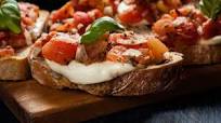 Bruschetta bread baked with tomatoes and mozzarella Bruschetta bread baked with tomatoes and mozzarella