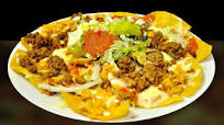 Totopos con carne y queso. Receta mexicana Totopos con carne y queso. Receta mexicana