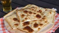 Focaccia di Recco allo stracchino Focaccia di Recco allo stracchino