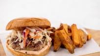 Spicy Asian-Style Pork Burger with sweet potato fries Spicy Asian-Style Pork Burger with sweet potato fries