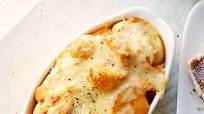 New potatoes with cheddar cheese sauce New potatoes with cheddar cheese sauce