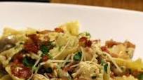 Chicken and Farfalle Pasta in a Roasted Garlic Cream Sauce Chicken and Farfalle Pasta in a Roasted Garlic Cream Sauce