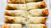 Cheesy Breadsticks Made from Pizza Dough