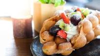 Bubble waffle with ice cream and fruits Bubble waffle with ice cream and fruits