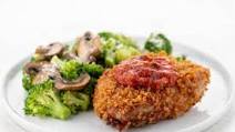 Breaded Pork Diavolo with Parmesan broccoli and mushrooms Breaded Pork Diavolo with Parmesan broccoli and mushrooms