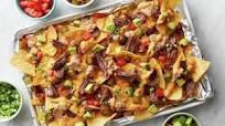 Slow-Cooker Beef Barbacoa Nachos with Queso Slow-Cooker Beef Barbacoa Nachos with Queso