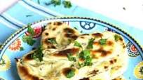 Homemade Naan Bread in a Frying Pan Homemade Naan Bread in a Frying Pan