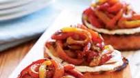 Grilled Goat Cheese Crostini with a Tangle of Marinated Roasted Peppers Grilled Goat Cheese Crostini with a Tangle of Marinated Roasted Peppers