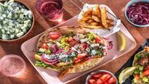 Pork Kofta Gyros with Naan Bread, Homemade Tzatziki and Tomato Salad Pork Kofta Gyros with Naan Bread, Homemade Tzatziki and Tomato Salad