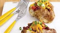 Chili-Cheese Baked Potatoes Chili-Cheese Baked Potatoes