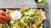 Cheesy Nachos with Guacamole and Salsa Cheesy Nachos with Guacamole and Salsa