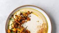Harissa Roasted Cauliflower on Hummus with Tahini Sauce Harissa Roasted Cauliflower on Hummus with Tahini Sauce
