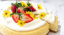 The Best Baked Lemon Cheesecake with White Chocolate Whipped Cream The Best Baked Lemon Cheesecake with White Chocolate Whipped Cream