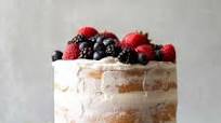 Coconut Cake with Whipped Cream Frosting and Fresh Berries Coconut Cake with Whipped Cream Frosting and Fresh Berries