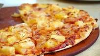 Home pizza with sausage and pineapple Home pizza with sausage and pineapple