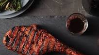 Honey Red Chile Bacon Tomahawk Pork Chop Honey Red Chile Bacon Tomahawk Pork Chop