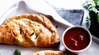 calzones with pepperoni, mushrooms and italian sausage calzones with pepperoni, mushrooms and italian sausage