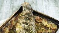 Whole roasted salmon stuffed with lemon and herbs Whole roasted salmon stuffed with lemon and herbs