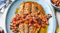 King Fish Roasted In Butter Served With A Delicious Provençale Sauce King Fish Roasted In Butter Served With A Delicious Provençale Sauce