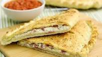 Three Cheese Ham Calzone With Homemade Marinara Sauce Three Cheese Ham Calzone With Homemade Marinara Sauce