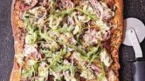 Artichoke and Arugula Pizza with Prosciutto Artichoke and Arugula Pizza with Prosciutto