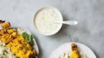Turmeric Chicken Kebabs over Basmati Rice with Charred Green Onions Turmeric Chicken Kebabs over Basmati Rice with Charred Green Onions