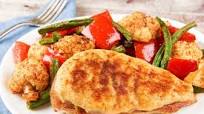 Hummus-Crusted Chicken with paprika roasted vegetables Hummus-Crusted Chicken with paprika roasted vegetables