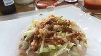 Tostadas de Manitas de Cerdo deshuesada al estilo Sonorense Tostadas de Manitas de Cerdo deshuesada al estilo Sonorense