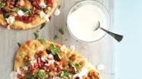 Indian chickpea pizza with lime raita Indian chickpea pizza with lime raita