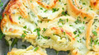 Cheesy Spinach and Artichoke Pinwheels Cheesy Spinach and Artichoke Pinwheels