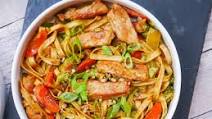 Pork and Noodle Stir Fry in a Savory Peanut Sauce Pork and Noodle Stir Fry in a Savory Peanut Sauce