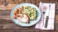 Grilled pork chops, champ potatoes, and glazed rhubarb with a mustard creme fraiche Grilled pork chops, champ potatoes, and glazed rhubarb with a mustard creme fraiche