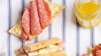 Prosciutto and brie baguette sandwich, ideal for picnics Prosciutto and brie baguette sandwich, ideal for picnics