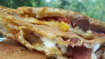 Quick Sausage and Bell Pepper Calzones Quick Sausage and Bell Pepper Calzones