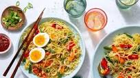 Hakka noodles with stir-fried vegetables and soft-cooked eggs Hakka noodles with stir-fried vegetables and soft-cooked eggs
