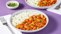 Indian-Style Chicken Curry with Rice, Bell Pepper, Onion & Cilantro Indian-Style Chicken Curry with Rice, Bell Pepper, Onion & Cilantro