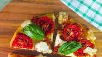 Homemade Margherita Pizza/ Thin Crust Tomato Basil Mozzarella Pizza Homemade Margherita Pizza/ Thin Crust Tomato Basil Mozzarella Pizza