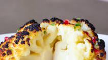 Whole Roasted Cauliflower with Pomegranate Tahini Sauce Whole Roasted Cauliflower with Pomegranate Tahini Sauce