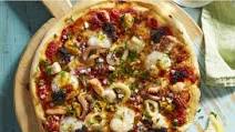 Earning a crust! Try this seafood marinara pizza recipe Earning a crust! Try this seafood marinara pizza recipe