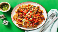 Chicken Sausage-Stuffed Zucchini Boats with Couscous, Tomato, and Basil Chicken Sausage-Stuffed Zucchini Boats with Couscous, Tomato, and Basil